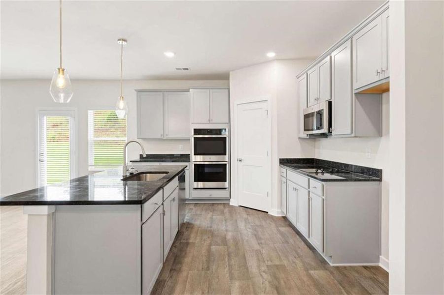 Furnished interior view inside a new home in Millstone Manor, Conyers (Image 5).