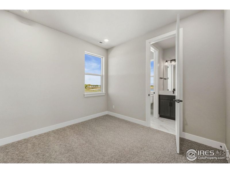 Spacious, unfurnished interior of a new home in Kitchel Lake at Serratoga Falls, Timnath (Image 15).