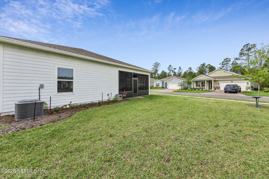 Exterior details and patio area of a home in , Yulee (Image 28).