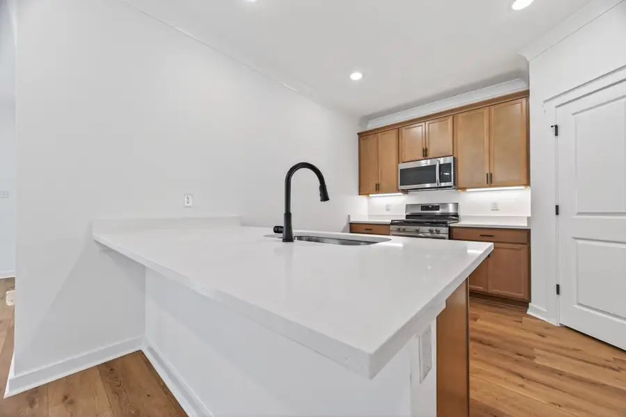 Furnished interior view inside a new home in Mostyn Springs, Magnolia (Image 9).