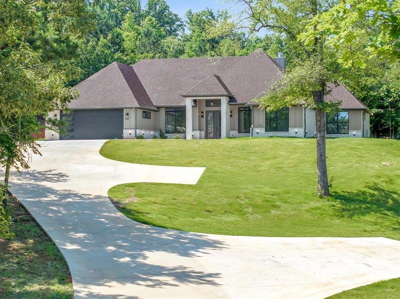 Front exterior of a new home in , Winona, TX, highlighting curb appeal (Image 26).