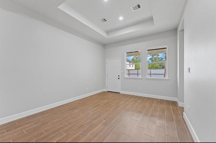 Living area view w/ back exterior door access Living area view w/ back exterior door access