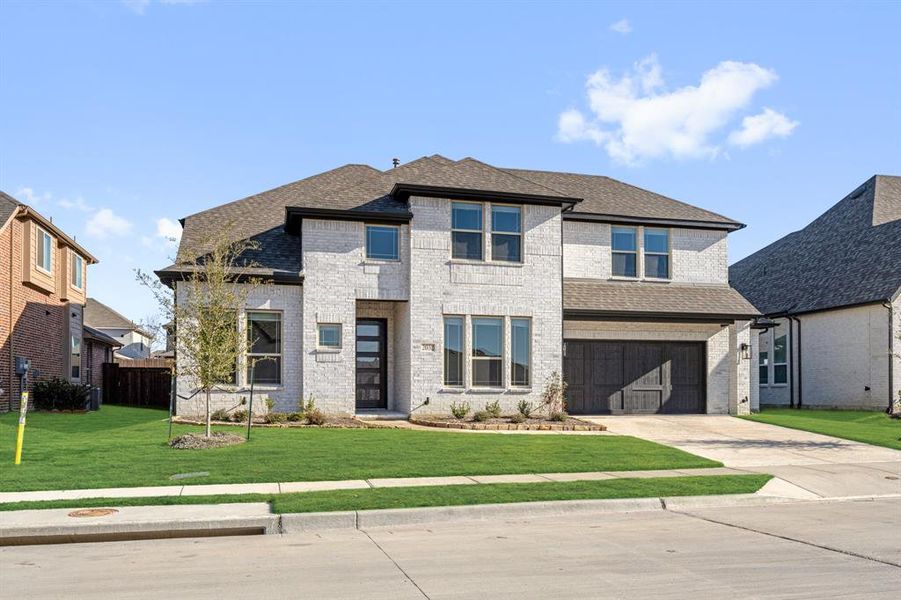 Front exterior of a new home in Devonshire Classic 60-65, Forney, TX, highlighting curb appeal (Image 2).