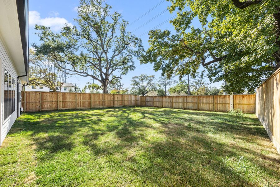Quite possibly one of the largest back yards in Oak Forest. Fully fenced for privacy w/ plenty of room for a pool and more!