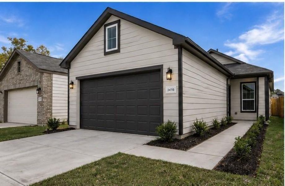 Front exterior of a new home in Crosby Terrace, Crosby, TX, highlighting curb appeal (Image 2). Front exterior of a new home in Crosby Terrace, Crosby, TX, highlighting curb appeal (Image 2).