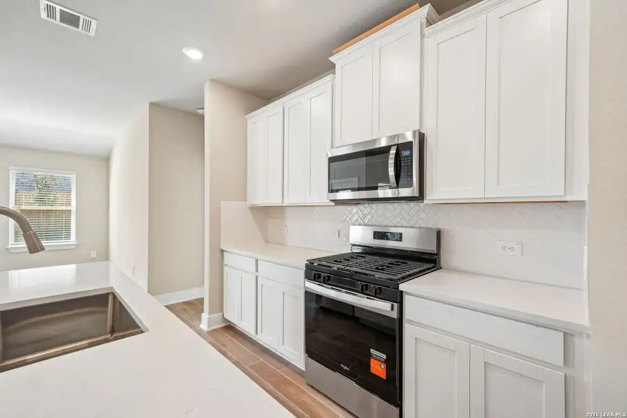 Furnished interior view inside a new home in Comanche Ridge, San Antonio (Image 6).
