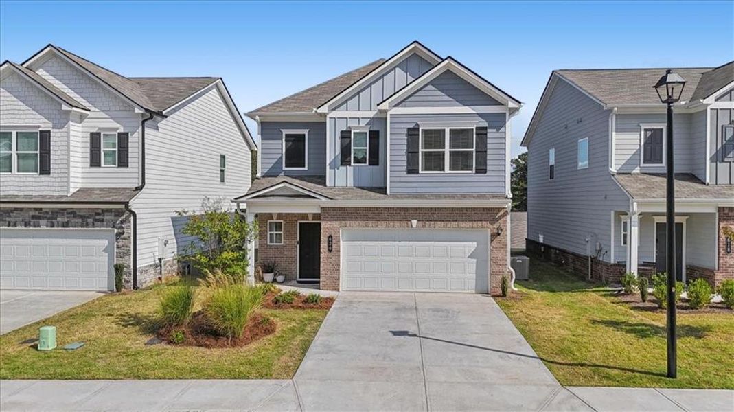 Front exterior of a new home in , Cartersville, GA, highlighting curb appeal (Image 26).