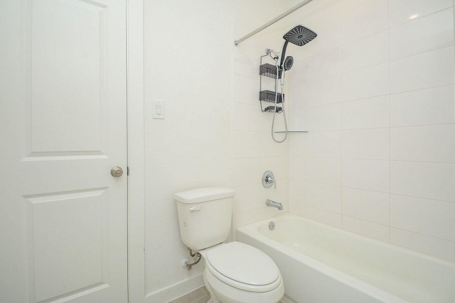 Clean, stylish secondary bath with a functional layout and timeless appeal. Clean, stylish secondary bath with a functional layout and timeless appeal.