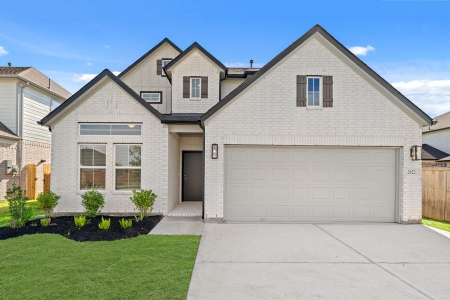 Front exterior of a new home in Morton Creek Ranch, Katy, TX, highlighting curb appeal (Image 14). Front exterior of a new home in Morton Creek Ranch, Katy, TX, highlighting curb appeal (Image 14).