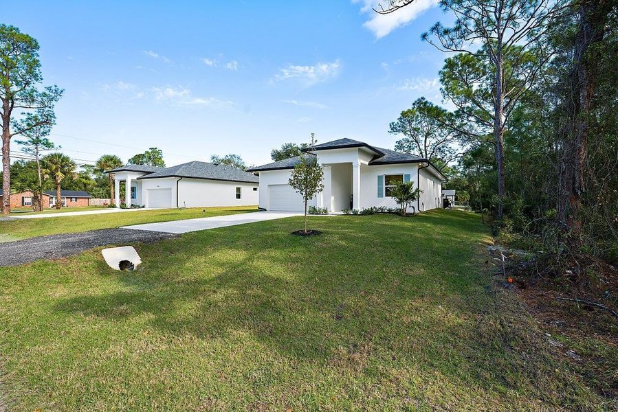 Exterior details and patio area of a home in , Vero Beach (Image 24).