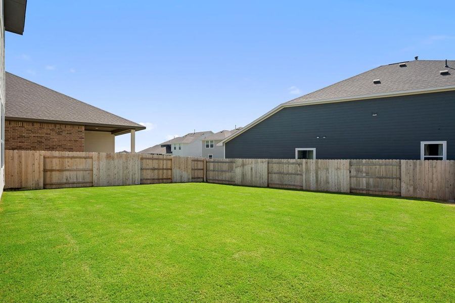 Exterior details and patio area of a home in Lariat, Liberty Hill (Image 23). Exterior details and patio area of a home in Lariat, Liberty Hill (Image 23).