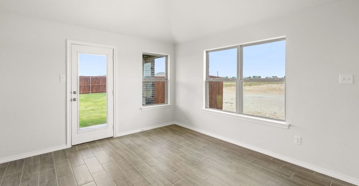 Representative exterior photo of a completed home built from the Atlanta by Impression Homes in Baker Farms, Cleburne, TX (Image 9). Representative exterior photo of a completed home built from the Atlanta by Impression Homes in Baker Farms, Cleburne, TX (Image 9).