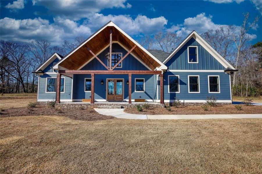Front exterior of a new home in , Covington, GA, highlighting curb appeal (Image 1). Front exterior of a new home in , Covington, GA, highlighting curb appeal (Image 1).