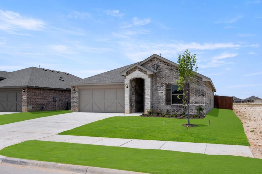 Representative exterior photo of a completed home built from the Atlanta by Impression Homes in Baker Farms, Cleburne, TX (Image 2). Representative exterior photo of a completed home built from the Atlanta by Impression Homes in Baker Farms, Cleburne, TX (Image 2).
