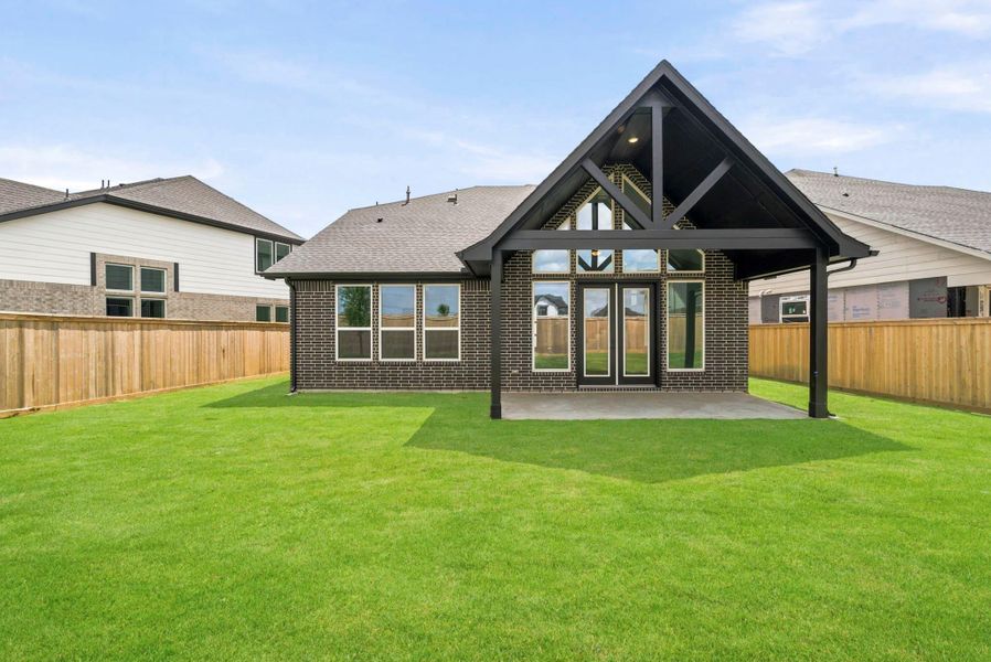 Exterior details and patio area of a home in Bridgeland 45', 50', 70', Cypress (Image 2). Exterior details and patio area of a home in Bridgeland 45', 50', 70', Cypress (Image 2).