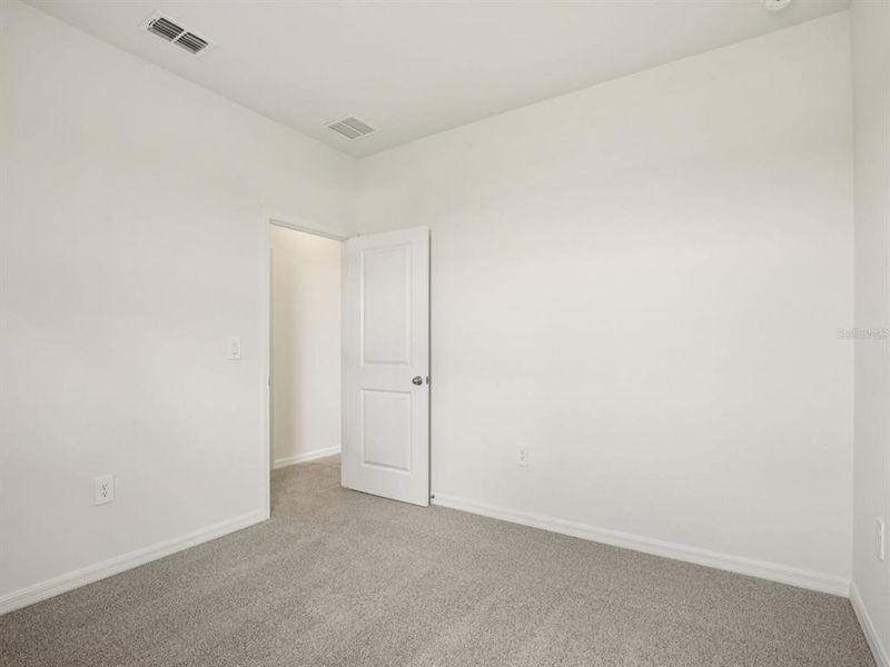 Spacious, unfurnished interior of a new home in Coasterra - Reserve Series, Palmetto (Image 19).