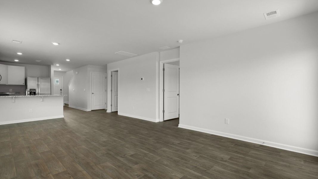 Spacious, unfurnished interior of a new home in Pine Hills Townhomes at Cane Bay, Summerville (Image 13).