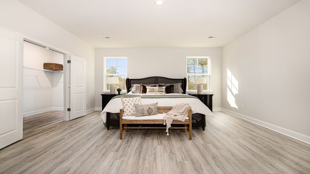 Furnished interior view inside a new home in Brunswick Plantation, Ash (Image 9).