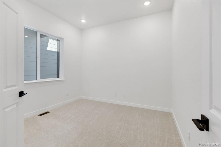 Spacious, unfurnished interior of a new home in Highlands Preserve, Mead (Image 26).