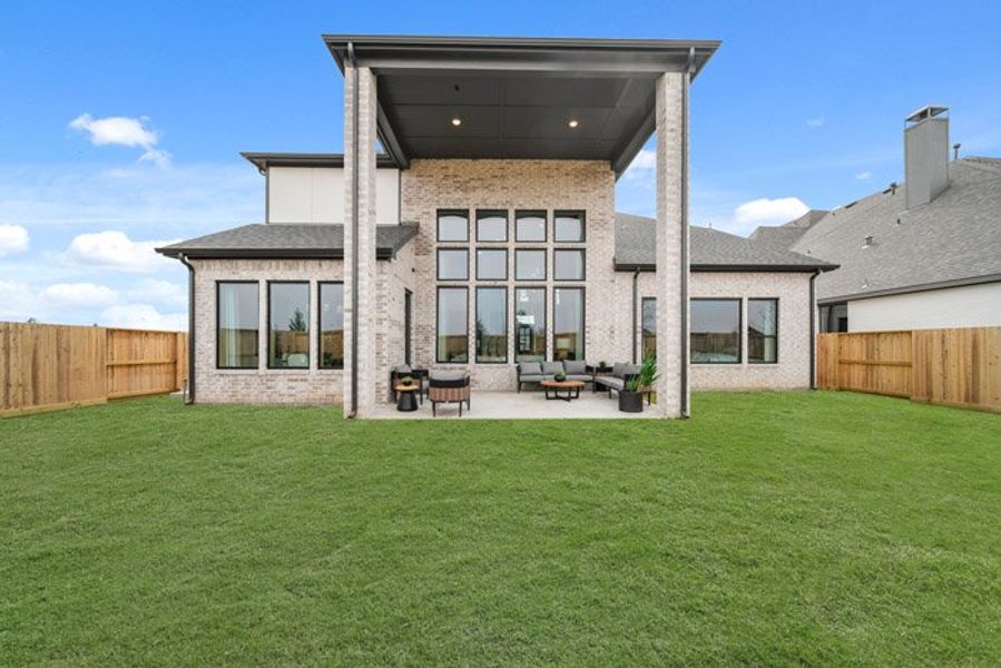 Exterior details and patio area of a home in Meridiana 40', 65', Manvel (Image 4). Exterior details and patio area of a home in Meridiana 40', 65', Manvel (Image 4).