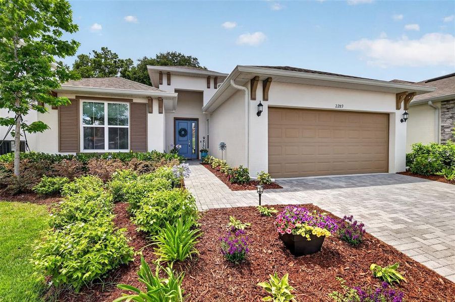 Front exterior of a new home in , Mount Dora, FL, highlighting curb appeal (Image 22).