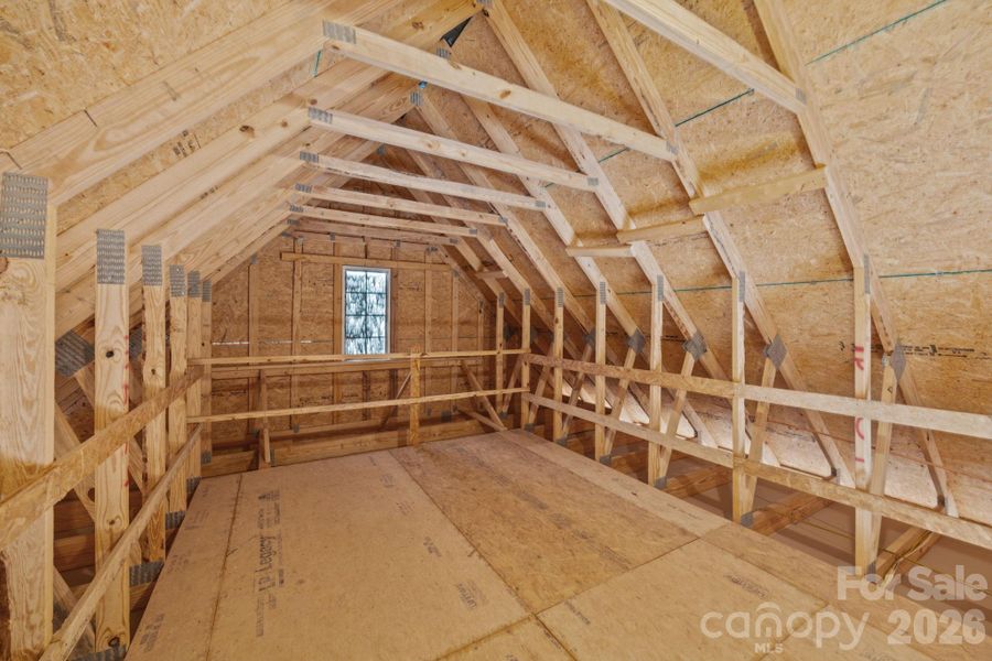 BONUS STORAGE ROOM accessed from pull down stairs in garage!  HUGE area to store all your extra's in life and keep the house clutter free. Love this!