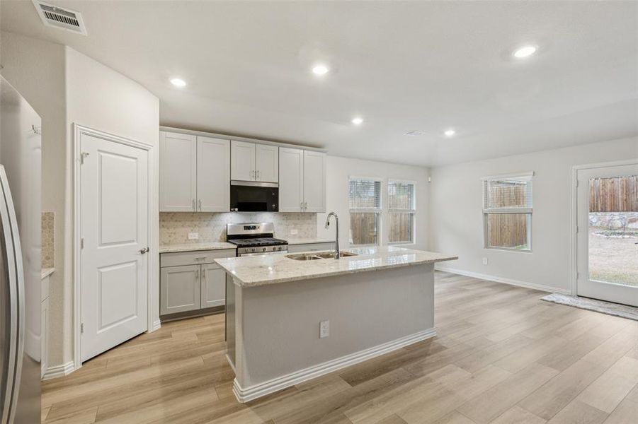 Furnished interior view inside a new home in Westmoor, Sherman (Image 6).