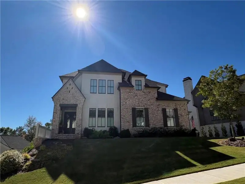 Front exterior of a new home in , Ball Ground, GA, highlighting curb appeal (Image 3).