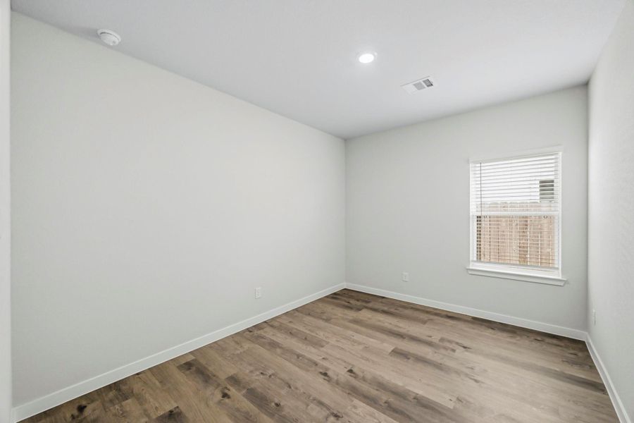 Spacious, unfurnished interior of a new home in Paloma at Sanford Farms, Waller (Image 13).