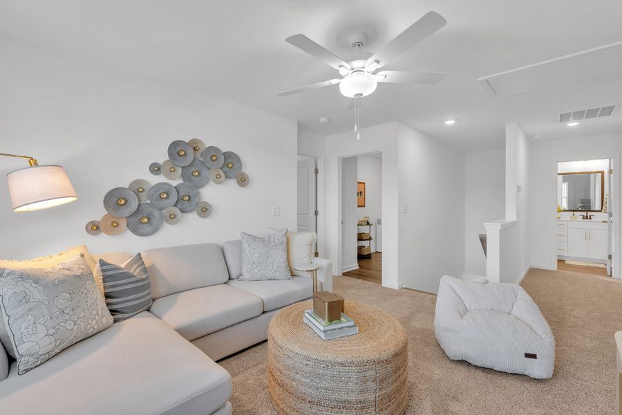 Representative furnished interior of a home built from the Benton II by Great Southern Homes in Springwood Grove, Central (Image 13).