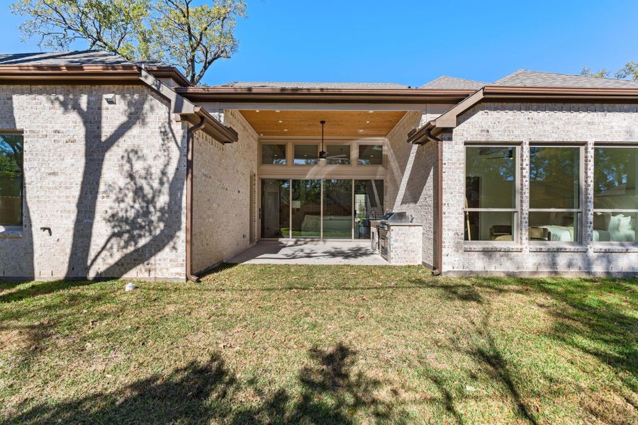 Exterior details and patio area of a home in , Houston (Image 24).