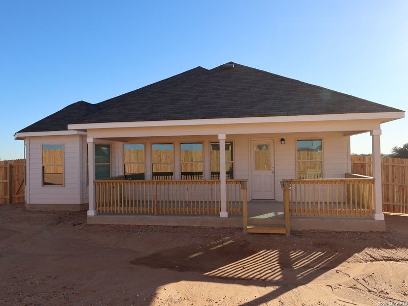 Exterior details and patio area of a home in Hickory Ridge, Elmendorf (Image 3).