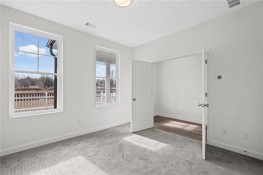 Spacious, unfurnished interior of a new home in The Village at River Green, Canton (Image 26).