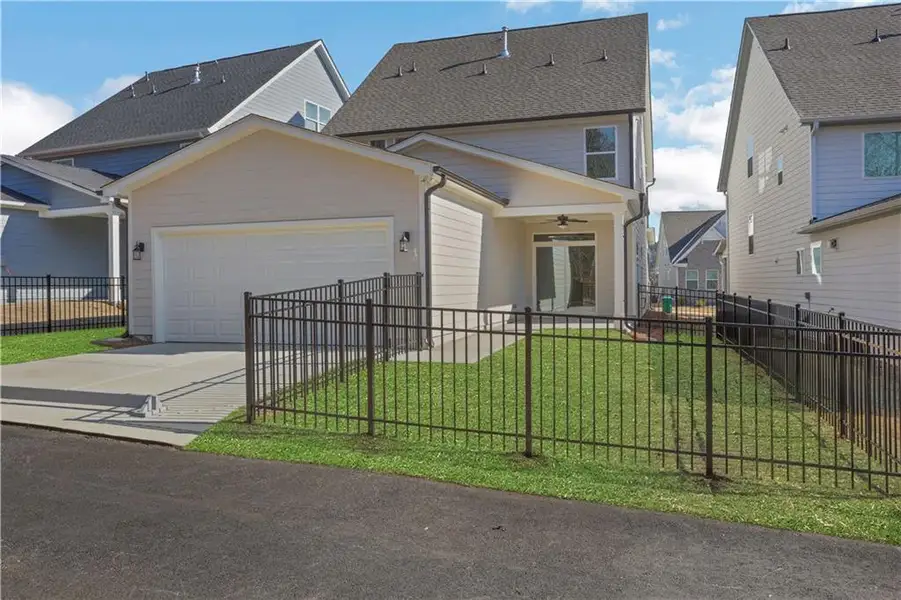 Exterior details and patio area of a home in Marble Tree, Ball Ground (Image 3).