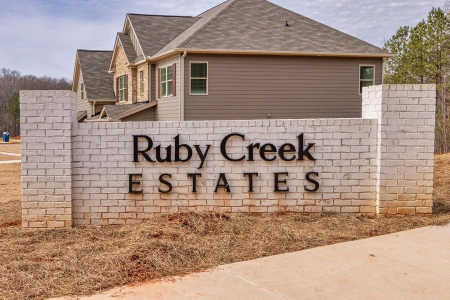 Front exterior of a new home in Ruby Creek Estates, Atlanta, GA, highlighting curb appeal (Image 27). Front exterior of a new home in Ruby Creek Estates, Atlanta, GA, highlighting curb appeal (Image 27).