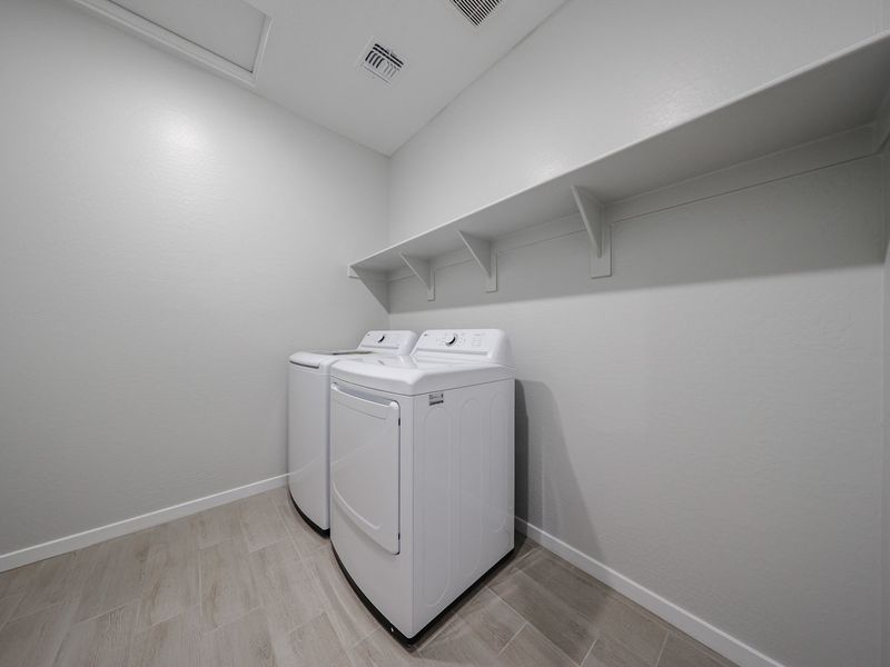 A white machine in a room. A white machine in a room.