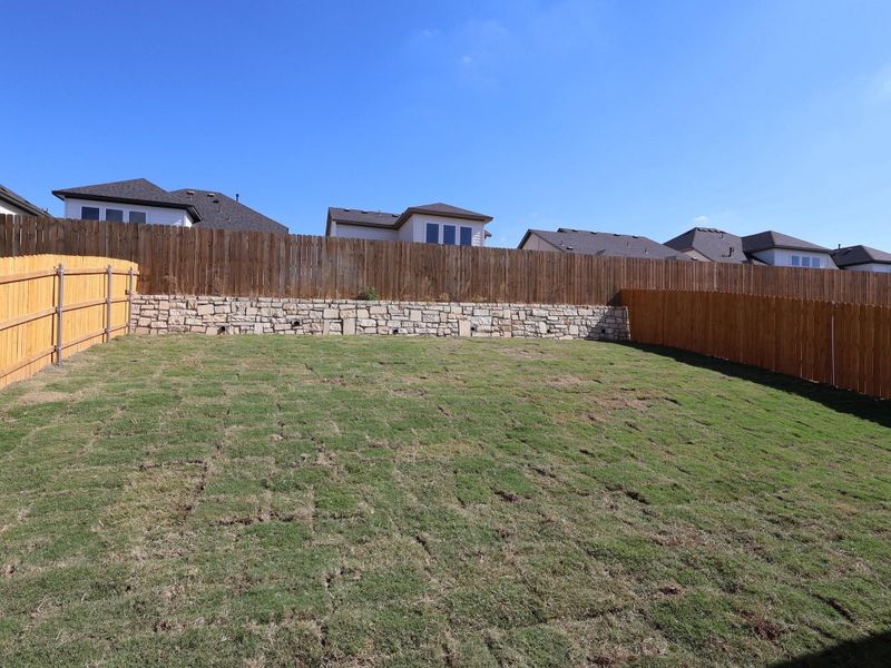 Exterior details and patio area of a home in Cedar Brook, Leander (Image 23).