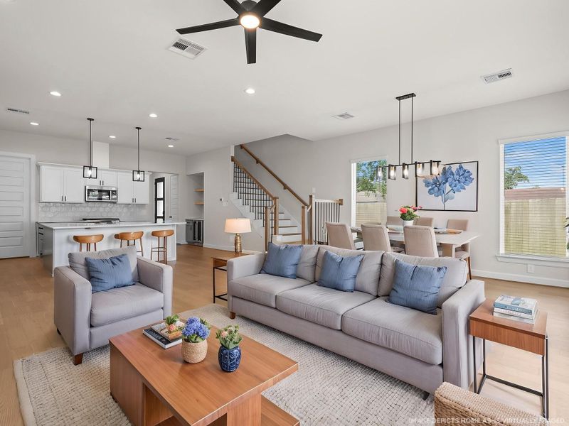 The heart of the home, this beautiful open floorplan blends modern style with practical functionality, creating an inviting space for gathering, and making memories. Image depicts home as-is virtually staged.