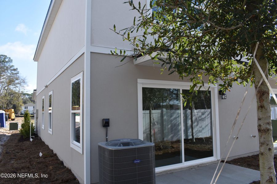 Exterior details and patio area of a home in Irongate Villas, Jacksonville (Image 3).