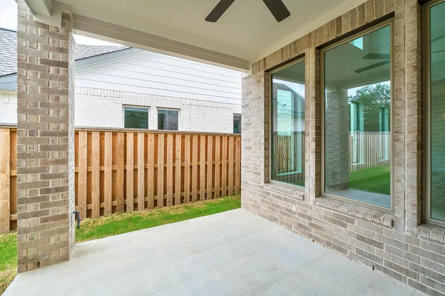 Exterior details and patio area of a home in Parmer Ranch, Georgetown (Image 23). Exterior details and patio area of a home in Parmer Ranch, Georgetown (Image 23).