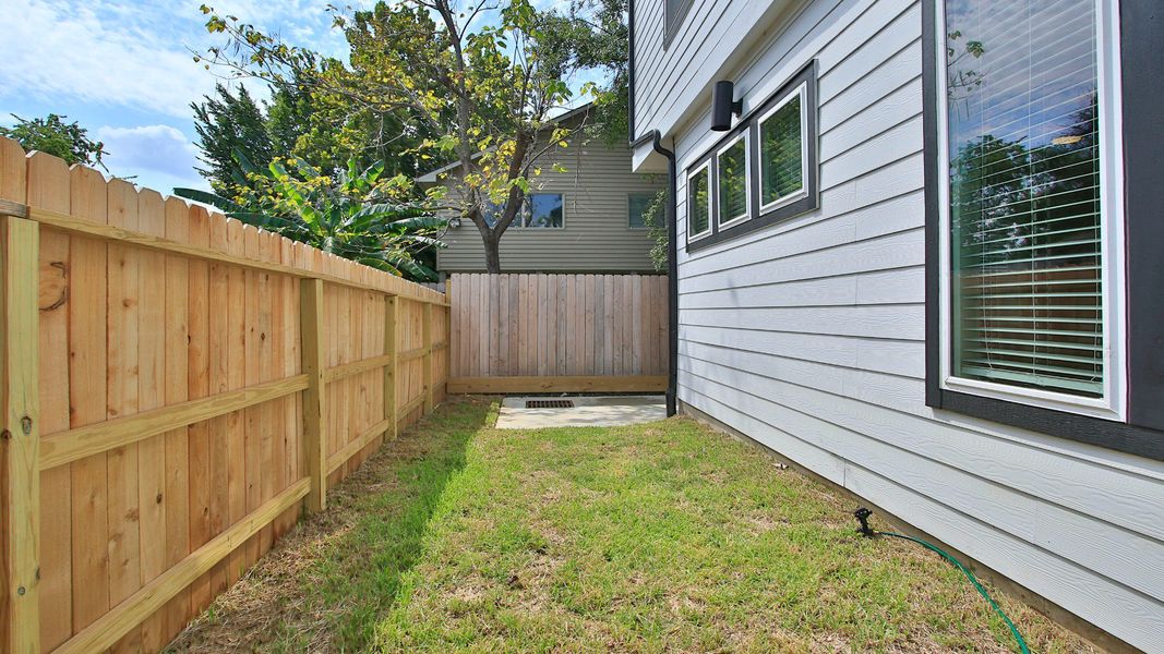Exterior details and patio area of a home in Shady Acres, Houston (Image 25).