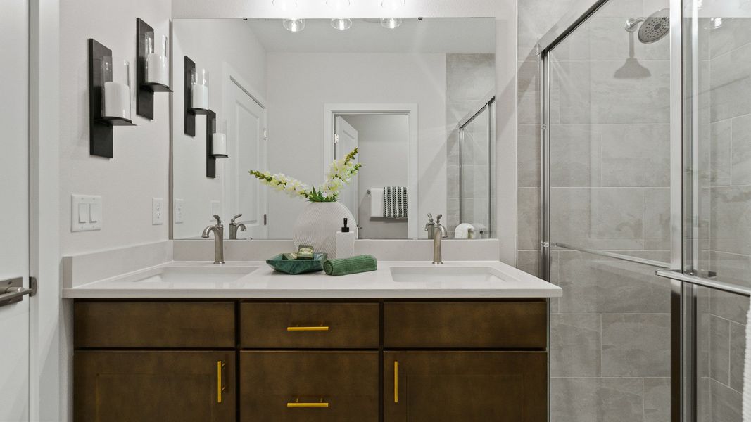 Atlantic Plan Single Story Home by DRB Homes, Primary Suite en suite bath in Liberty Trace in Haines City, FL