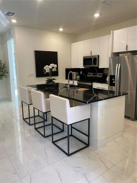 Furnished interior view inside a new home in , Port Charlotte (Image 35). Furnished interior view inside a new home in , Port Charlotte (Image 35).