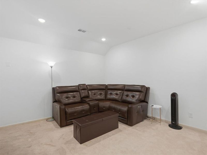 Carpeted room featuring recessed lighting and white walls