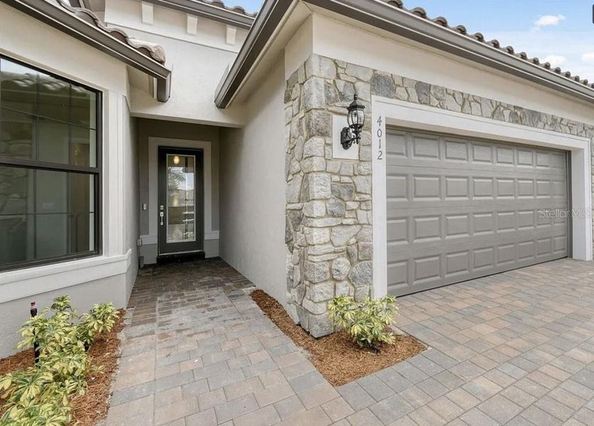 Exterior details and patio area of a home in Preserve at Waterway Village, Vero Beach (Image 25).