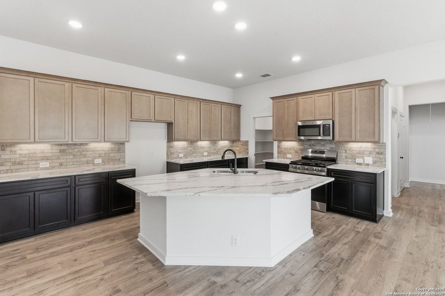 Furnished interior view inside a new home in The Crossvine – Garden Homes, Schertz (Image 5).