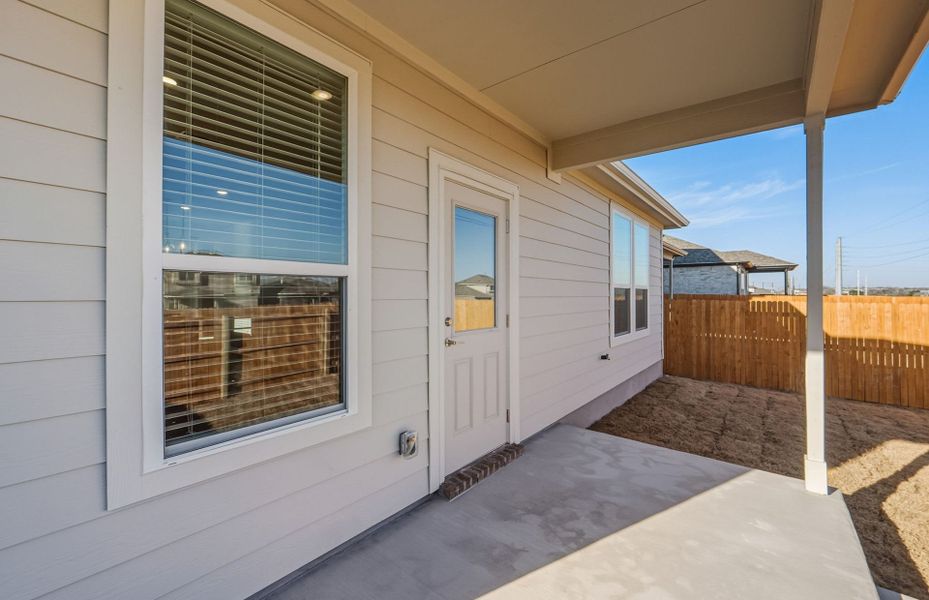 Exterior details and patio area of a home in Crosswinds, Kyle (Image 3).