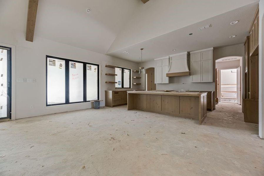 View of kitchen and dining area, from the entryway. View of kitchen and dining area, from the entryway.