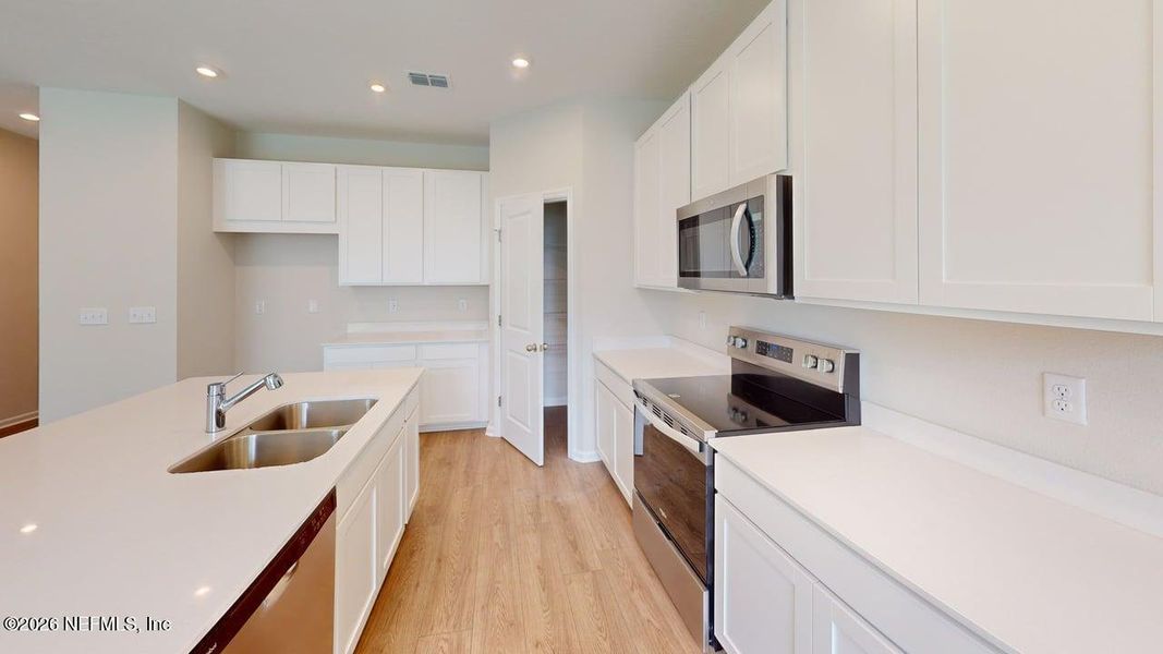 Furnished interior view inside a new home in Sandridge Hills, Green Cove Springs (Image 5).