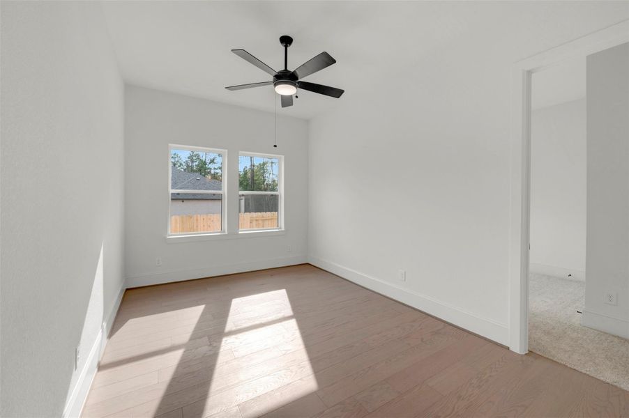 Spacious, unfurnished interior of a new home in The Woodlands Hills - Premier Collection, Willis (Image 17).